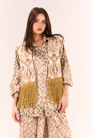 Short gillet with lurex fringes