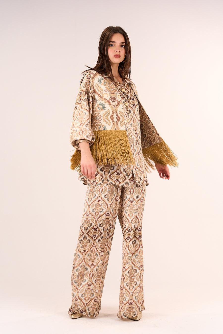 Short gillet with lurex fringes