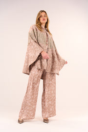 Cape with lurex fringes