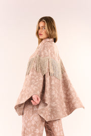 Cape with lurex fringes