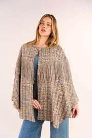 Tweed cape with lurex fringes