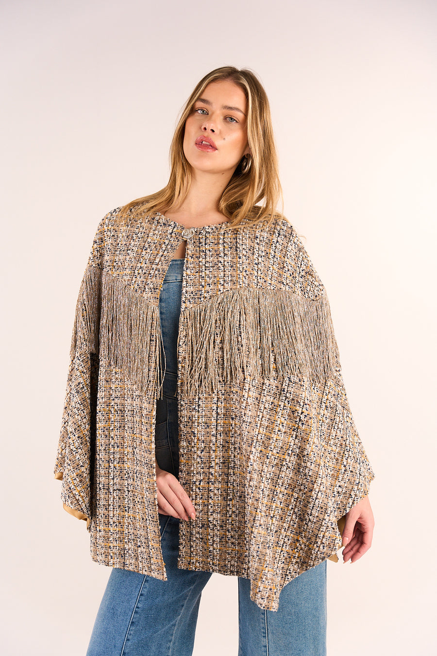Tweed cape with lurex fringes